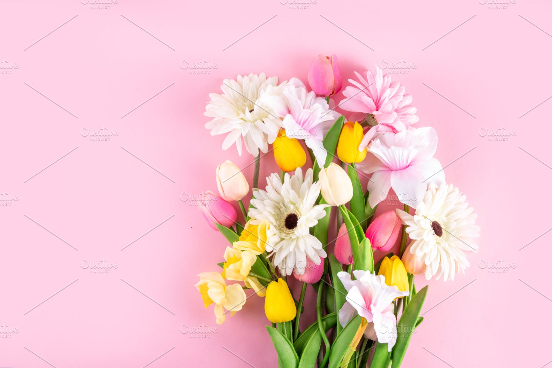Beautiful spring flowers bouquet on pastel pink background, a Holiday Photo by Rimma