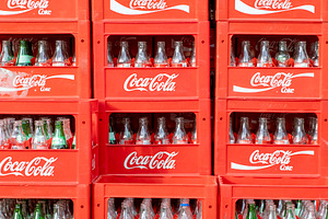 Glass bottles in red Coca Cola boxes, a Food & Drink Photo by BOOCYS