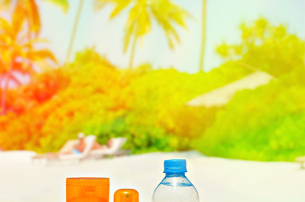 Sun protection cream on palm beach, a Health & Medical Photo by LiliGraphie