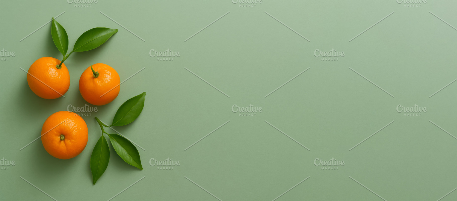 Mandarins and green leaves arranged, a Photo by Dvoevnore photos