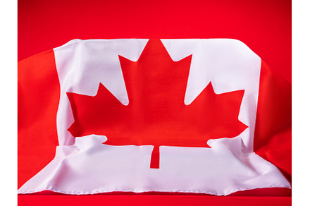 Canadian maple leaf flag on podium, a Holiday Photo by Lifemorning