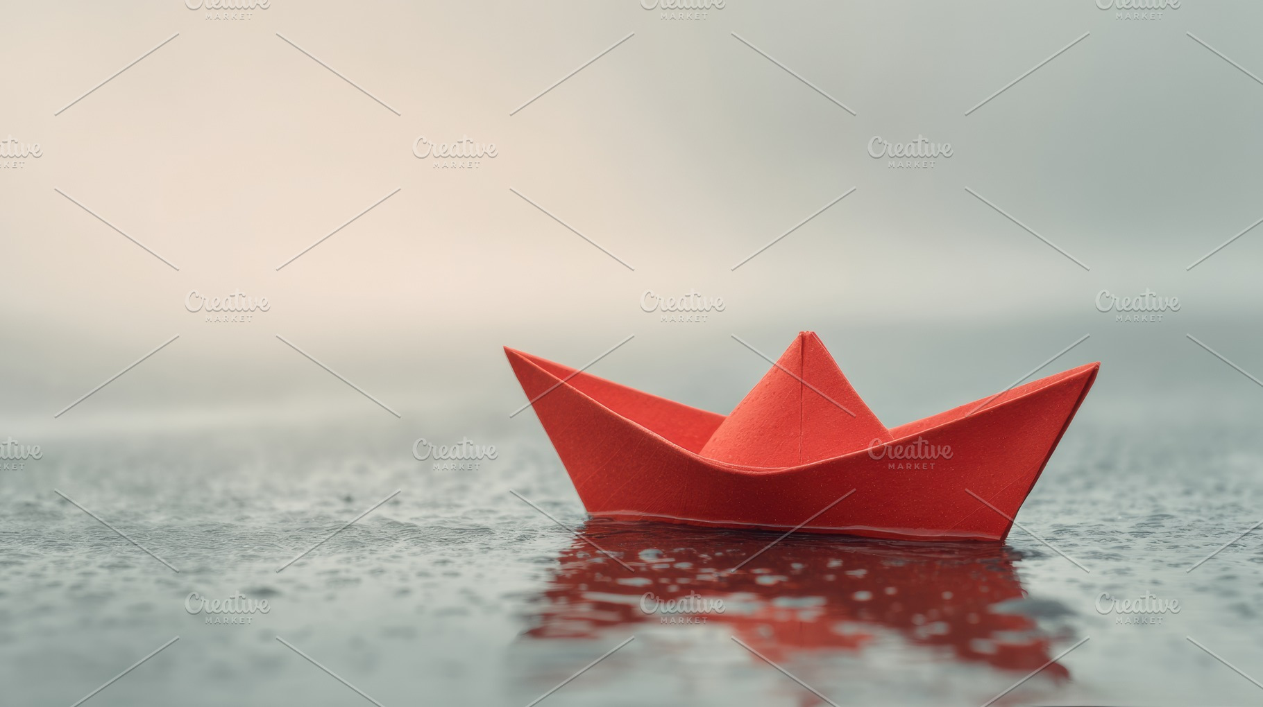 Red Paper Boat on Pale Water Surface, a Photo by Virgo Studio