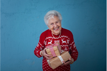 Portrait of happy senior woman, a Holiday Photo by HalfPoint