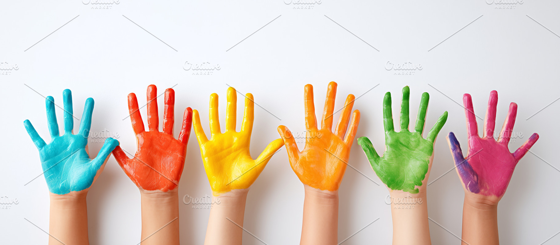 Row of children's hands covered in, a Person Photo by MistyDay