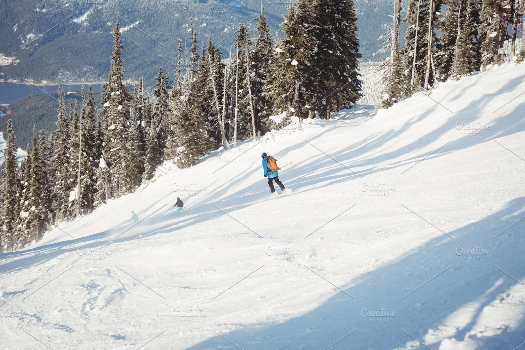Skier skiing on snowy mountains, a Photo by WavebreakPremium