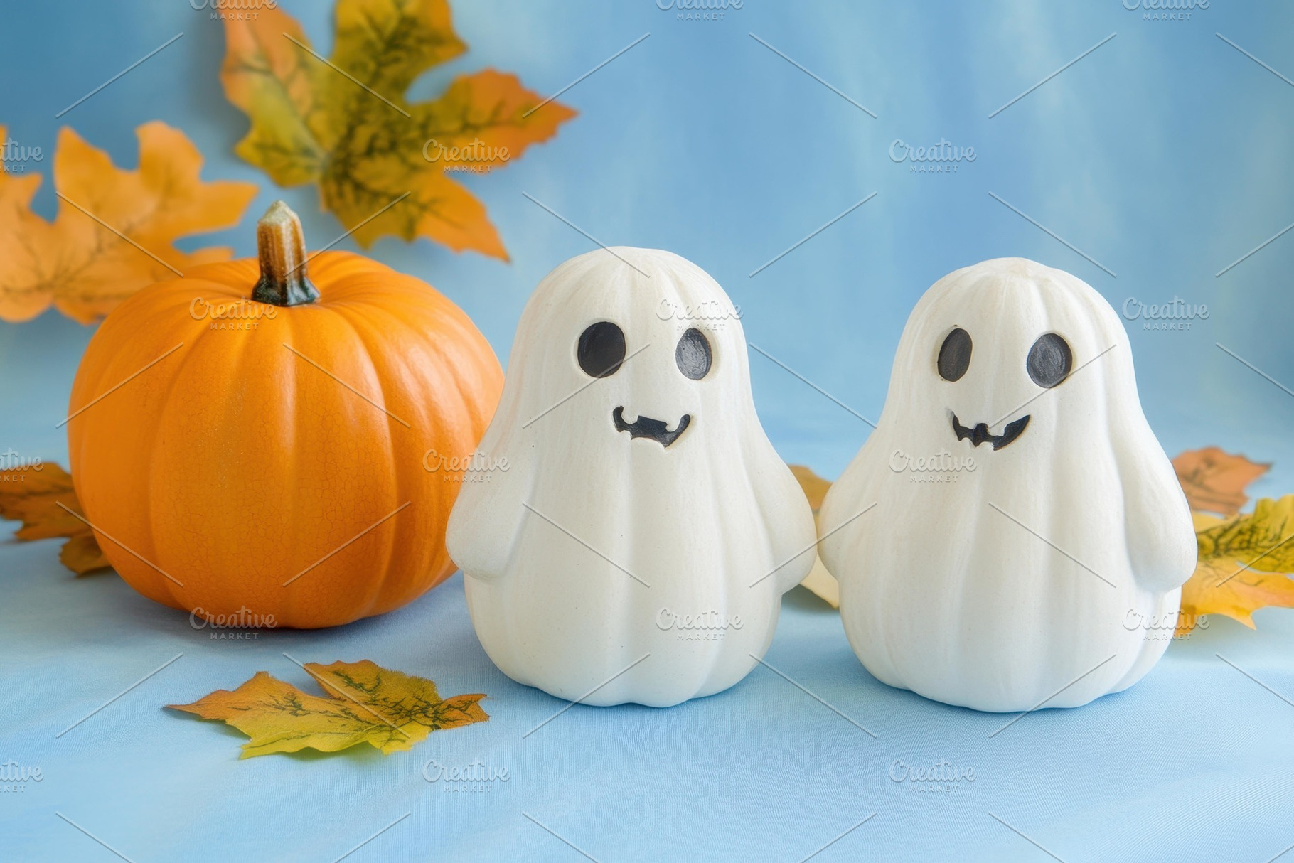 Cute ghost-shaped decorations with a, a Photo by Tanuart