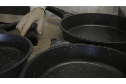 Restaurant. Frying pans. Action, a Person Photo by Media Whale Stock