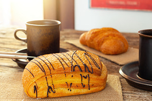 Delicious Saccottino with Chocolate and Coffee Enjoyed for Breakfast on Rustic, a Food & Drink Photo by Antonio Gravante Market