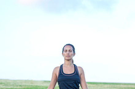 A Young woman doing yoga exercise outdoor, a Sports & Recreation Photo by 2Design