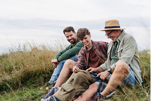 Grandfather, father and teen boy, a Person Photo by HalfPoint