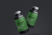 Supplement Bottle Mockups, a Packaging Mockup by Graphicsfuel (Thumbnail 11 of 12)