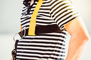 Man wearing safety harness, black, a Photo by Dvoevnore photos