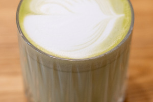 Matcha latte healthy beverage glass cream green, a Food & Drink Photo by Photo Drive Studio