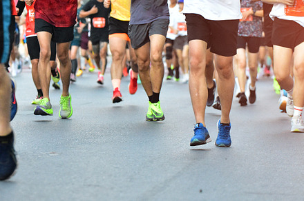 People Running On City Road.