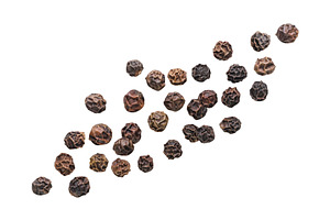 Peppercorns flying close-up on a, a Food & Drink Photo by innakreativ