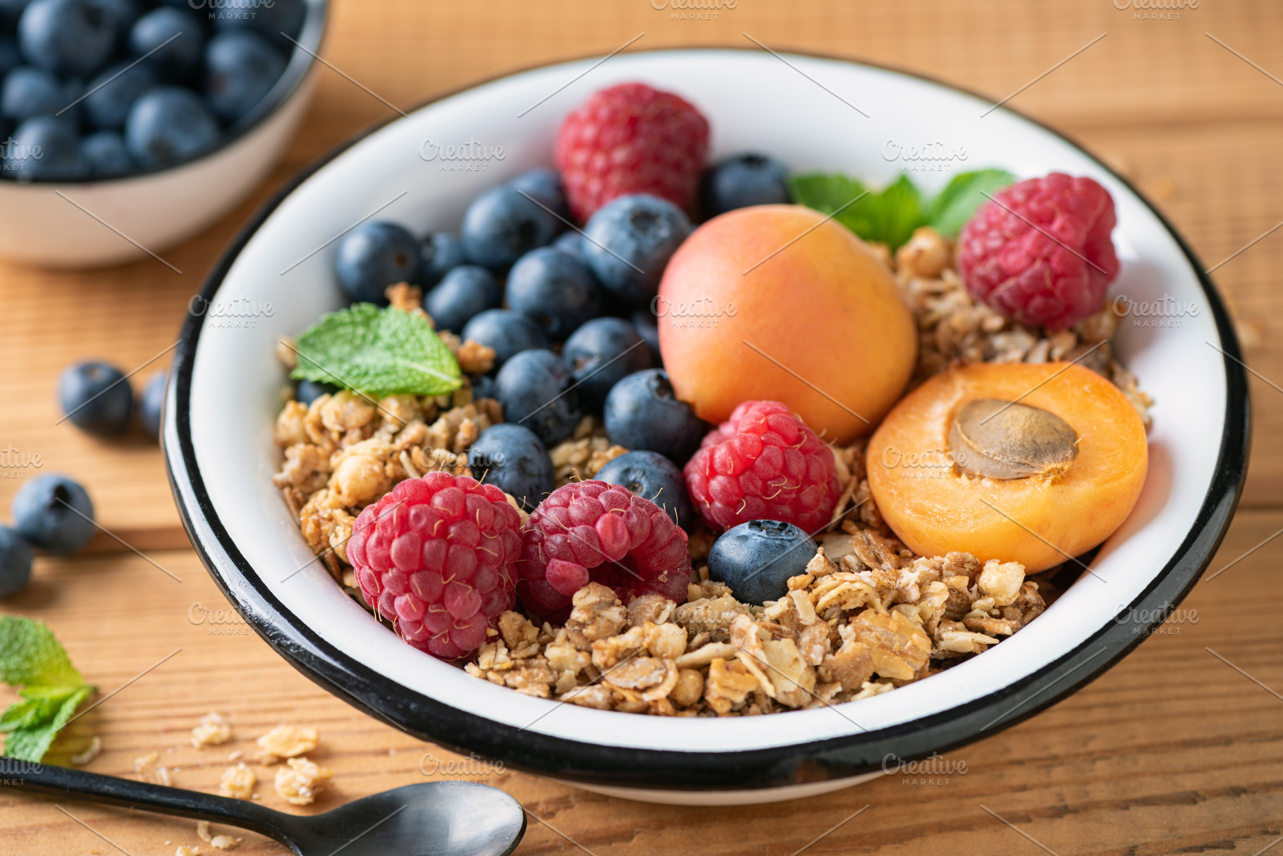Crunchy oat honey granola with fruit, a Food & Drink Photo by The baking man