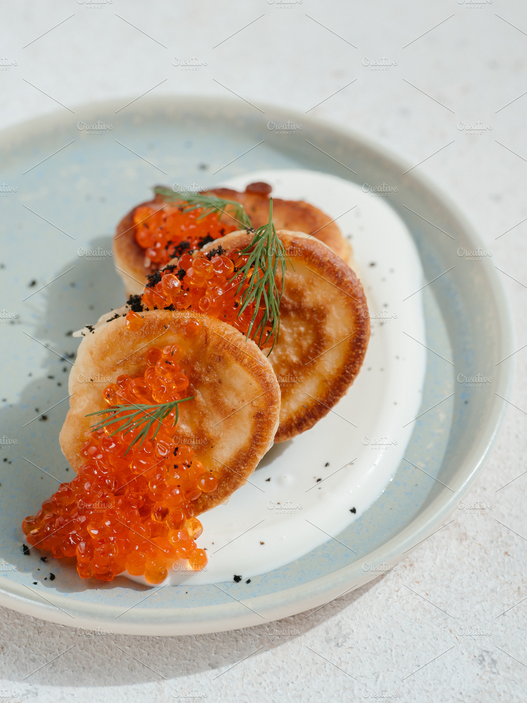 Pancakes with Salmon Roe, Sour Cream, a Food & Drink Photo by Fascinadora