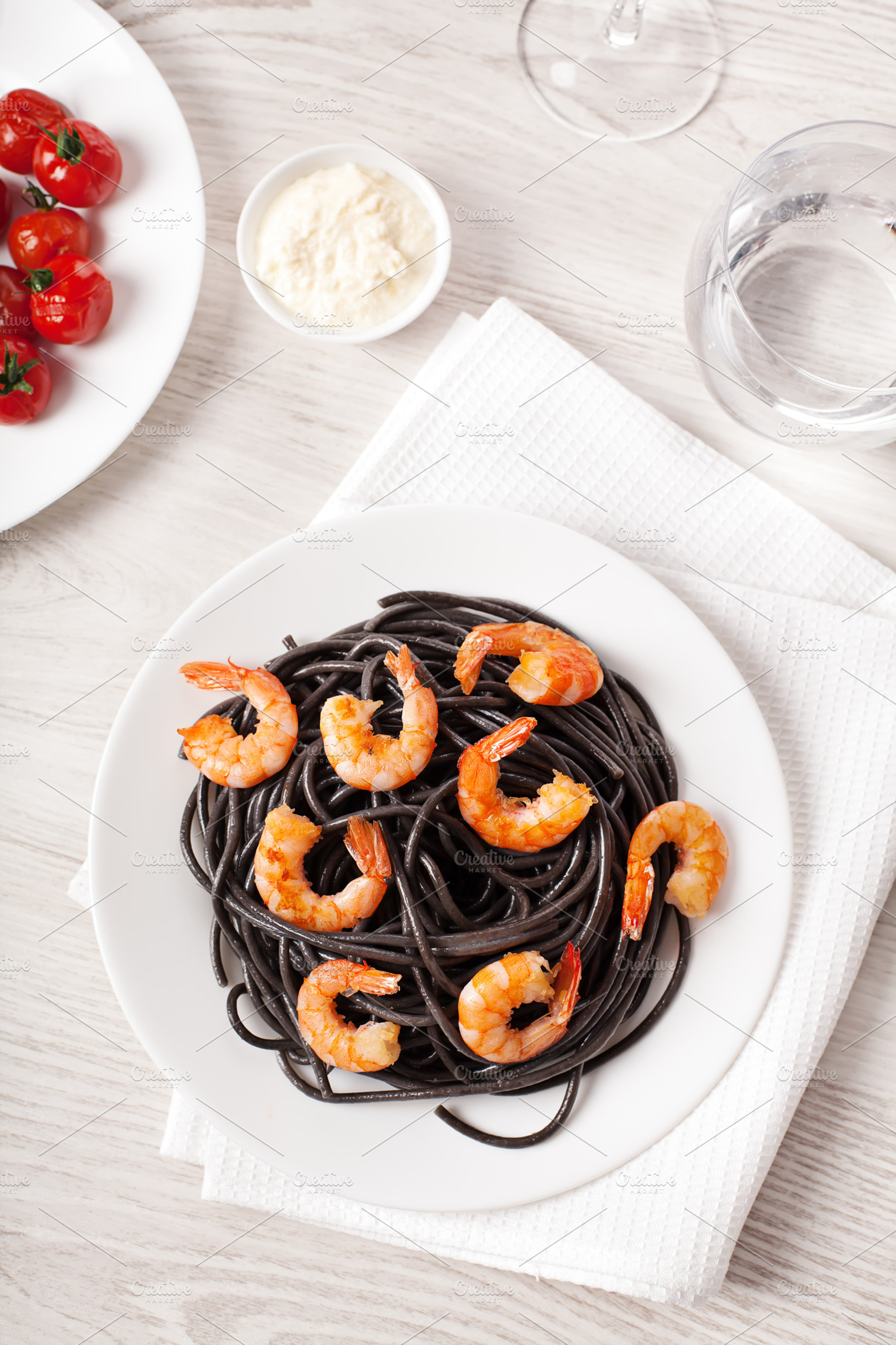 Black Italian Pasta With Shrimps Food On Light Background