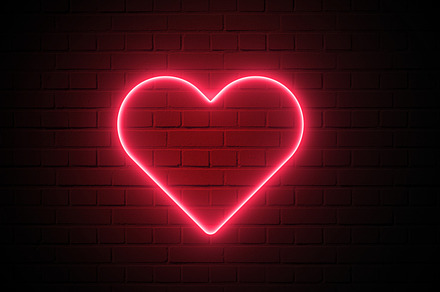 Red heart shape neon light on dark wall background. Abstract and, an Abstract Photo by Ministocker