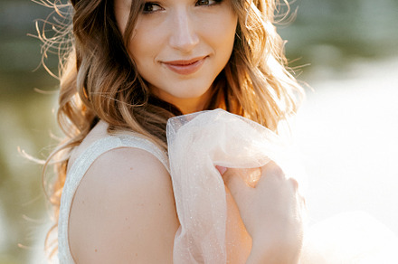 bride against the background of a yellow sunset