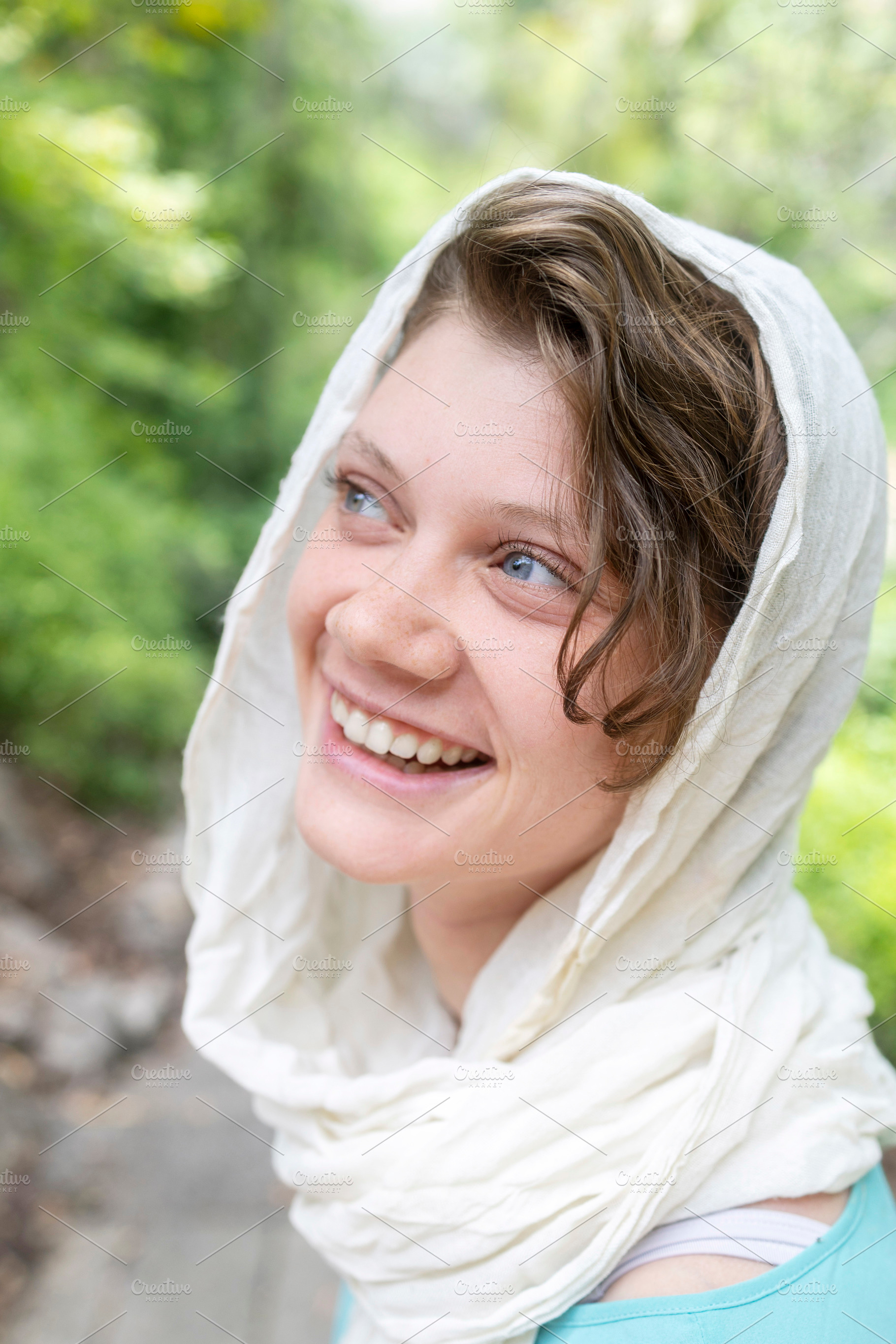 A portrait of a smiling young woman, a Person Photo by Imaginarium