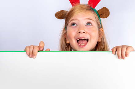 Christmas holiday background with funny girl, a Holiday Photo by Rimma