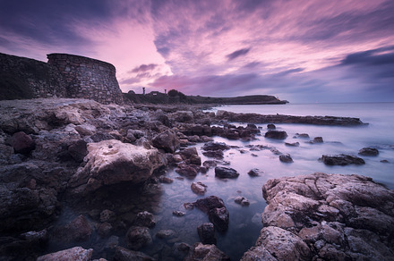 Sea waves with rocks at sunset stock photo containing sea and ocean, a Nature Photo by den-belitsky