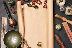 Religious objects for prayer and meditation, with a sheet of bro, a Background Photo by ndanko