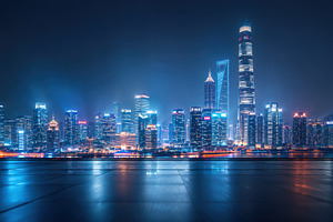 Bright city lights shine at night, a Photo by Beautiful things