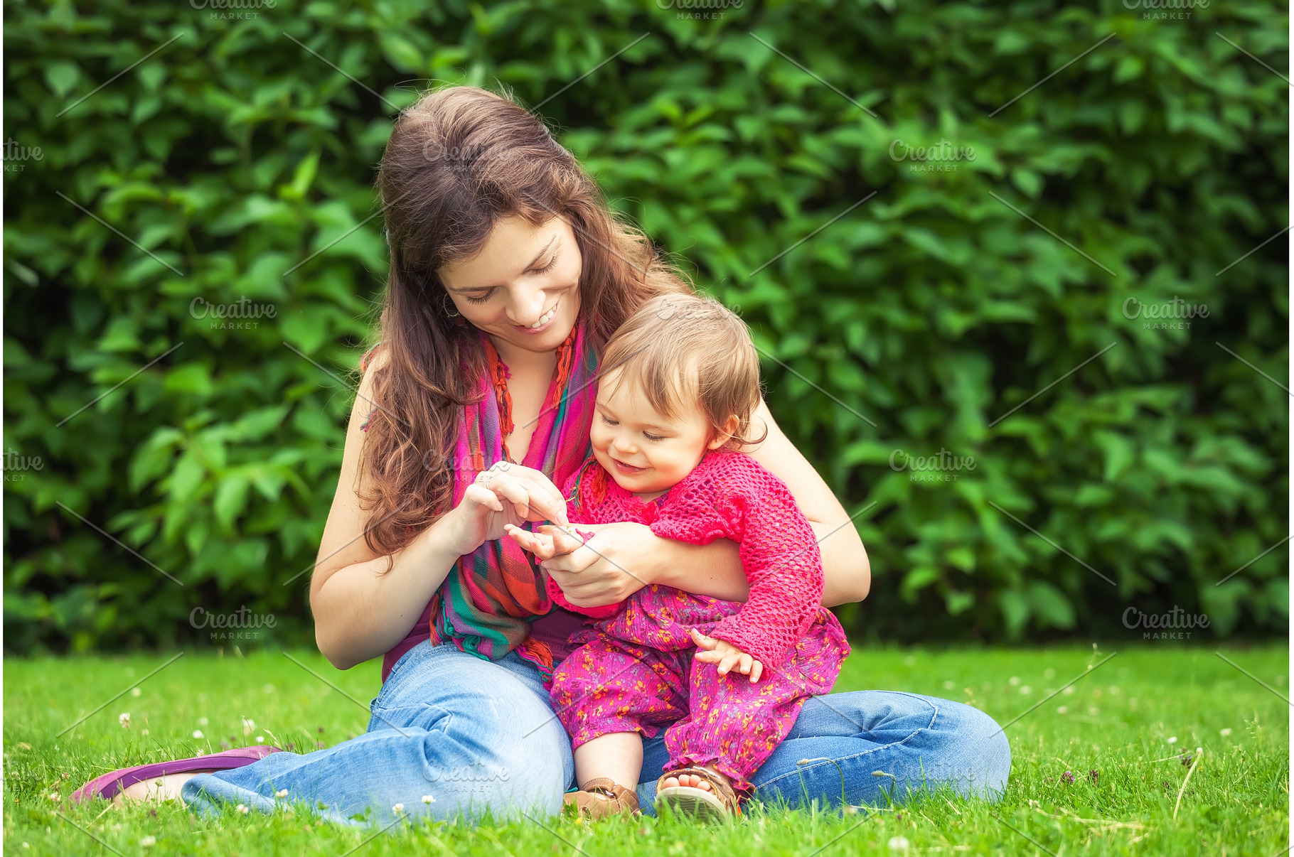 Mother with baby in the park, a Person Photo by sborisov