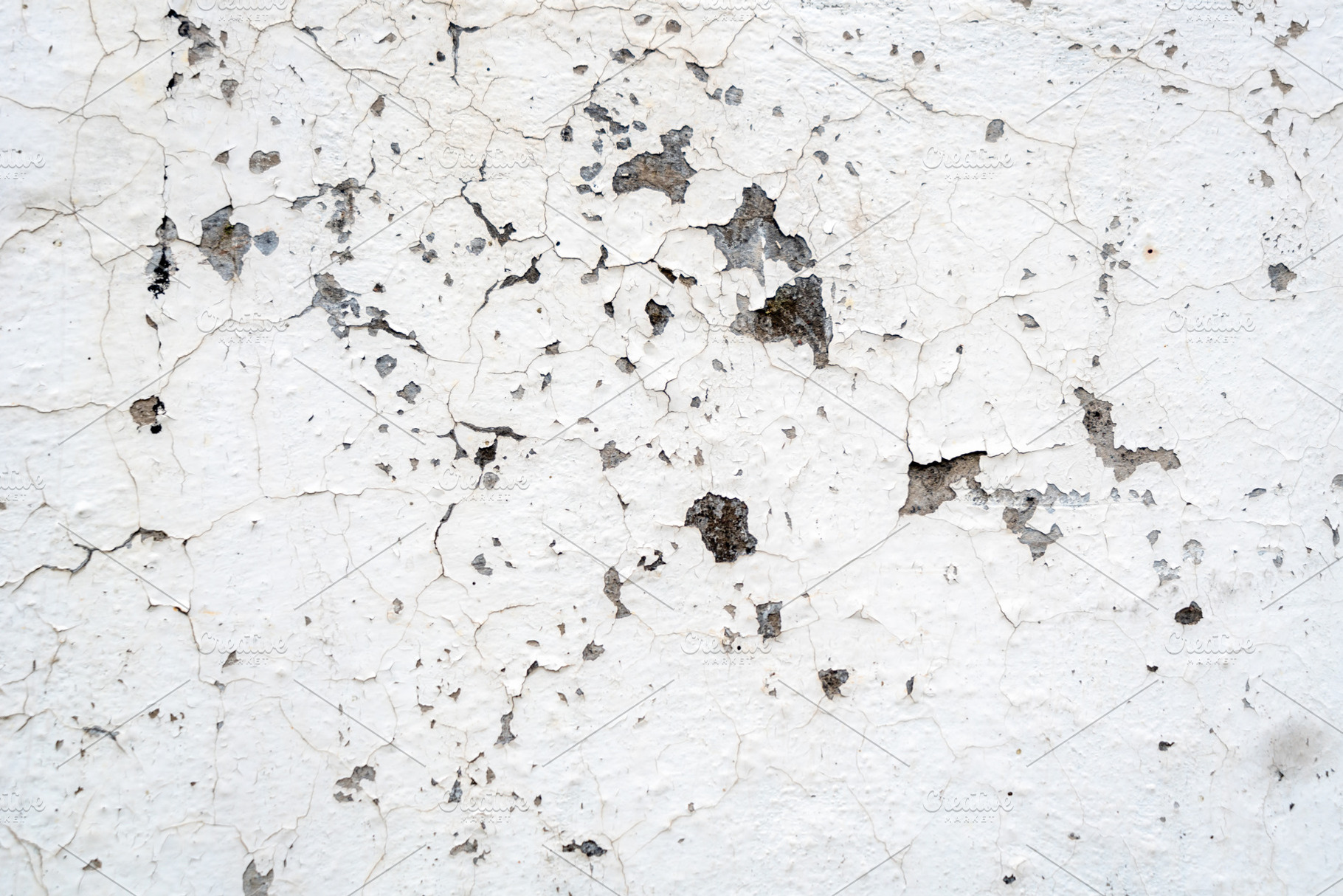 Cracked texture of an old wall with peeling paint, an Architecture Photo by GoodGoods