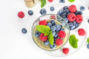 Healthy breakfast chia pudding with raspberry and blueberry, a Food & Drink Photo by Rimma