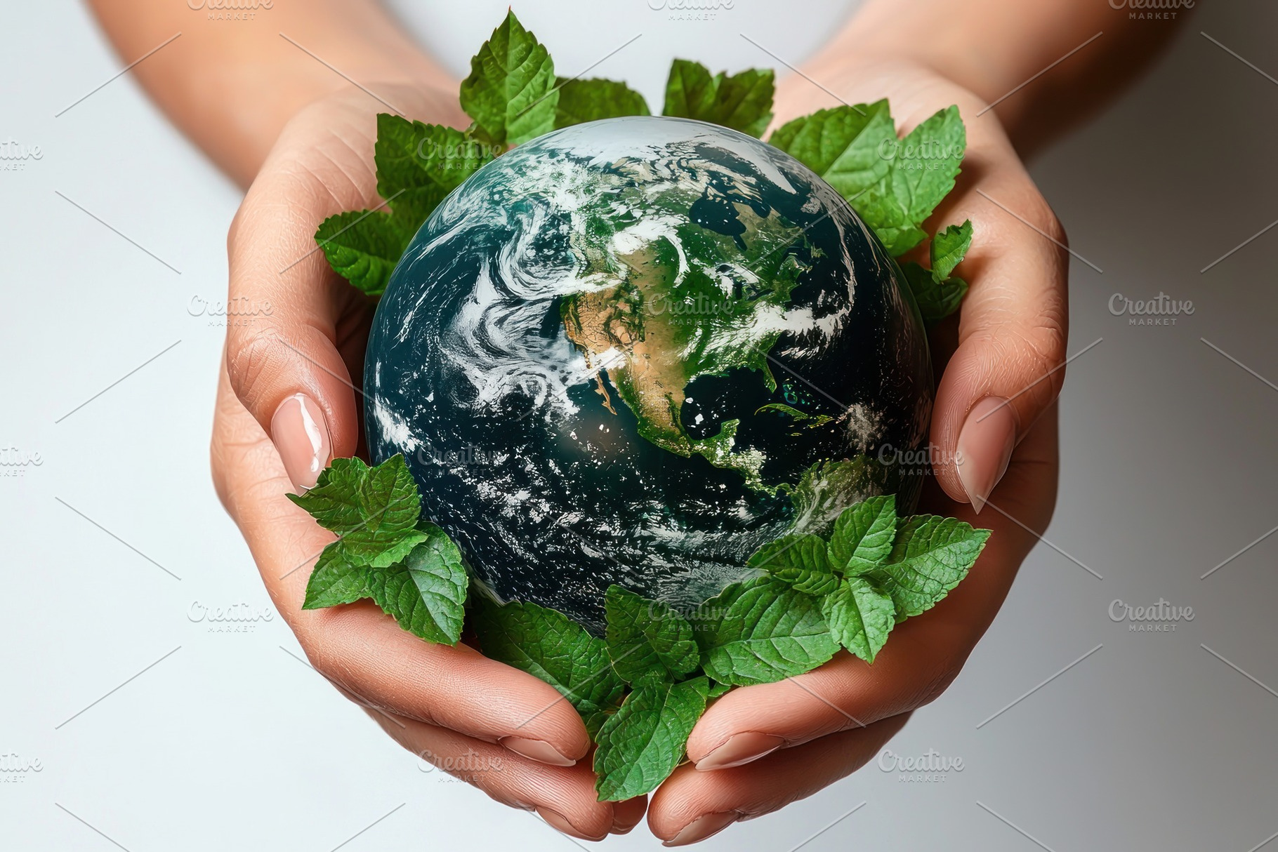 Hands gently holding Earth surrounded by fresh green mint leaves, a Food & Drink Photo by José Manuel Gelpi