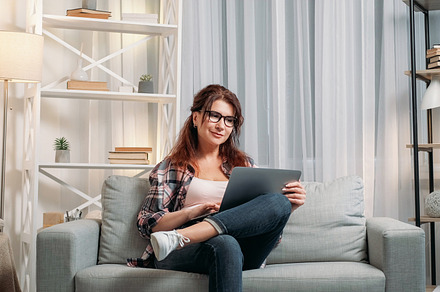 Virtual life happy woman home rest smiling laptop, a Person Photo by Photo Drive Studio