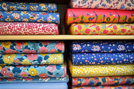 A variety of colorful fabric rolls, a Photo by Pavel_design