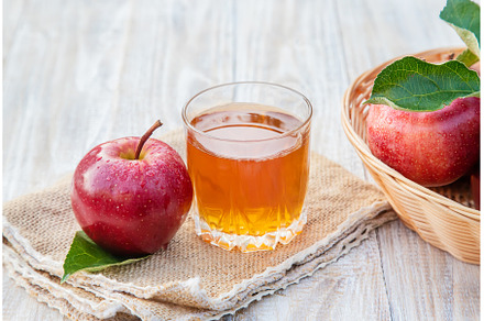 Apple juice in a glass. Selective, a Food & Drink Photo by yanadjana