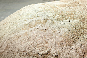 Pile of sand for cement mixing waiting to be used in construction, an Industrial Photo by Antonio Gravante Market
