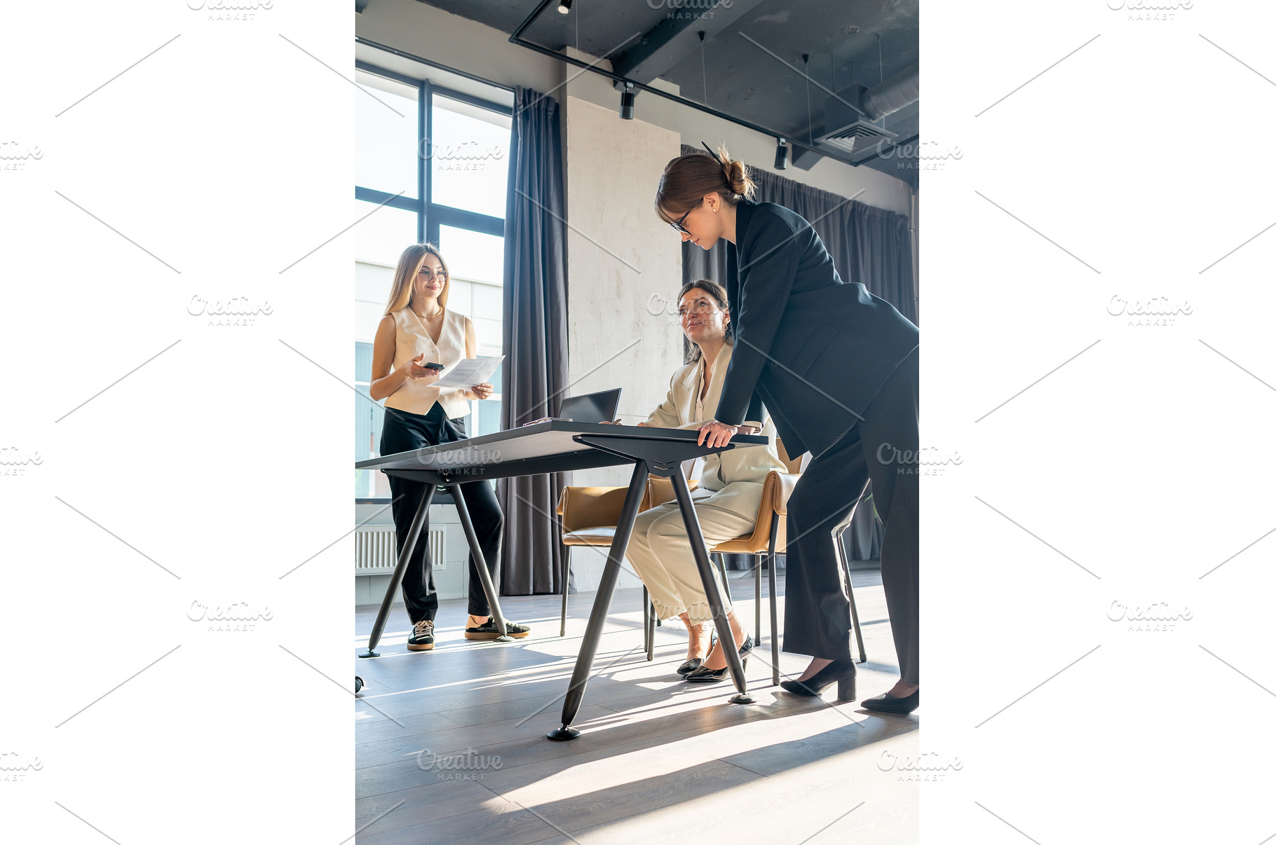 Three business women in modern, a Business Photo by undrey