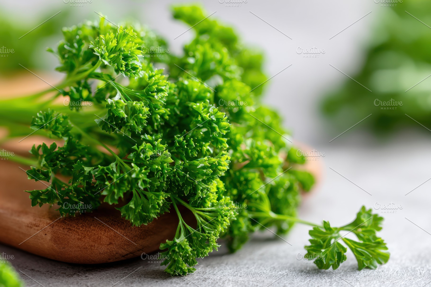 Fresh and ripe parsley on wooden board, a Food & Drink Photo by AlyaAnd