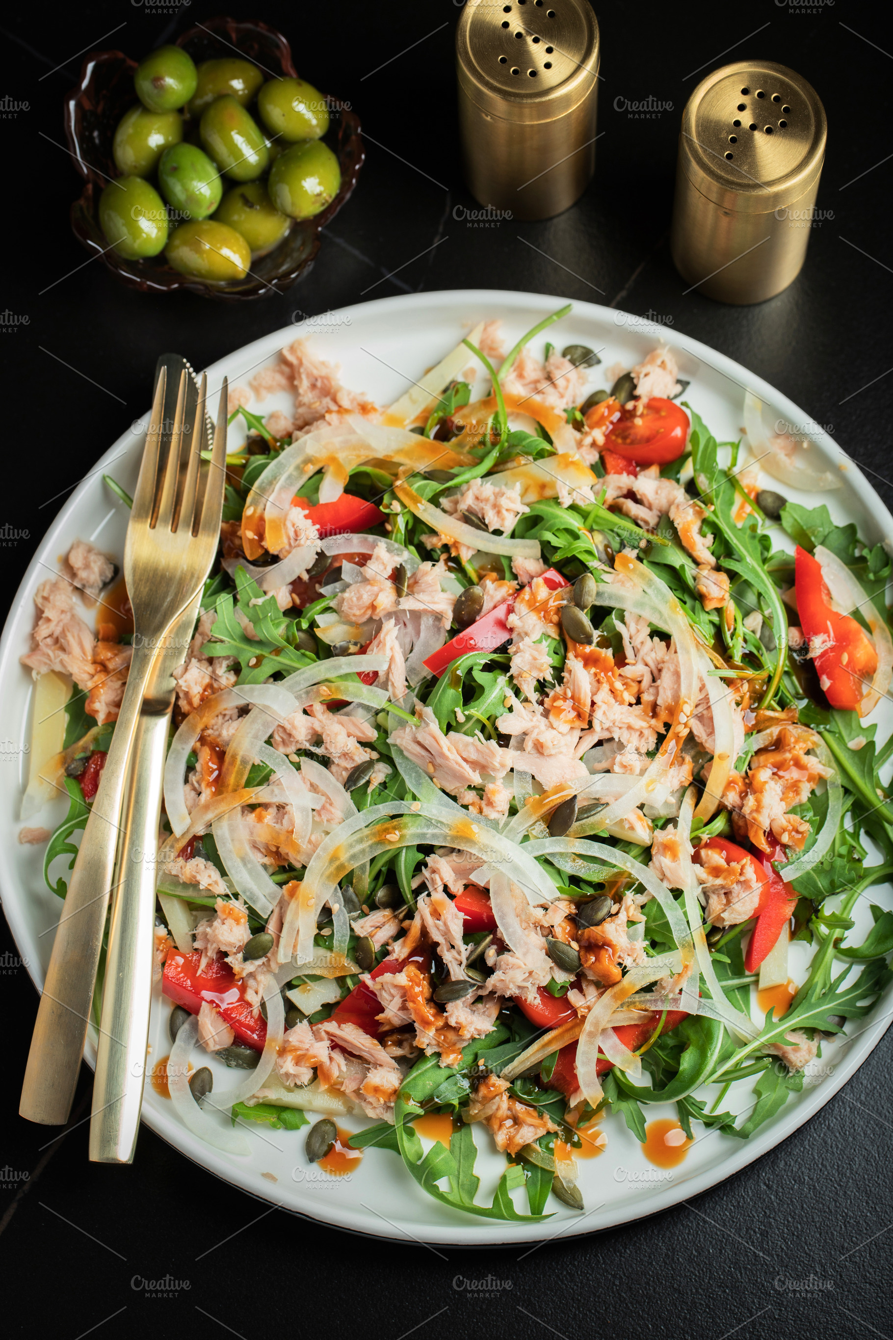 Fresh Tuna Salad with Onions and Cherry Tomatoes. Italian Mediterranean Cuisine, a Food & Drink Photo by Budarinphoto