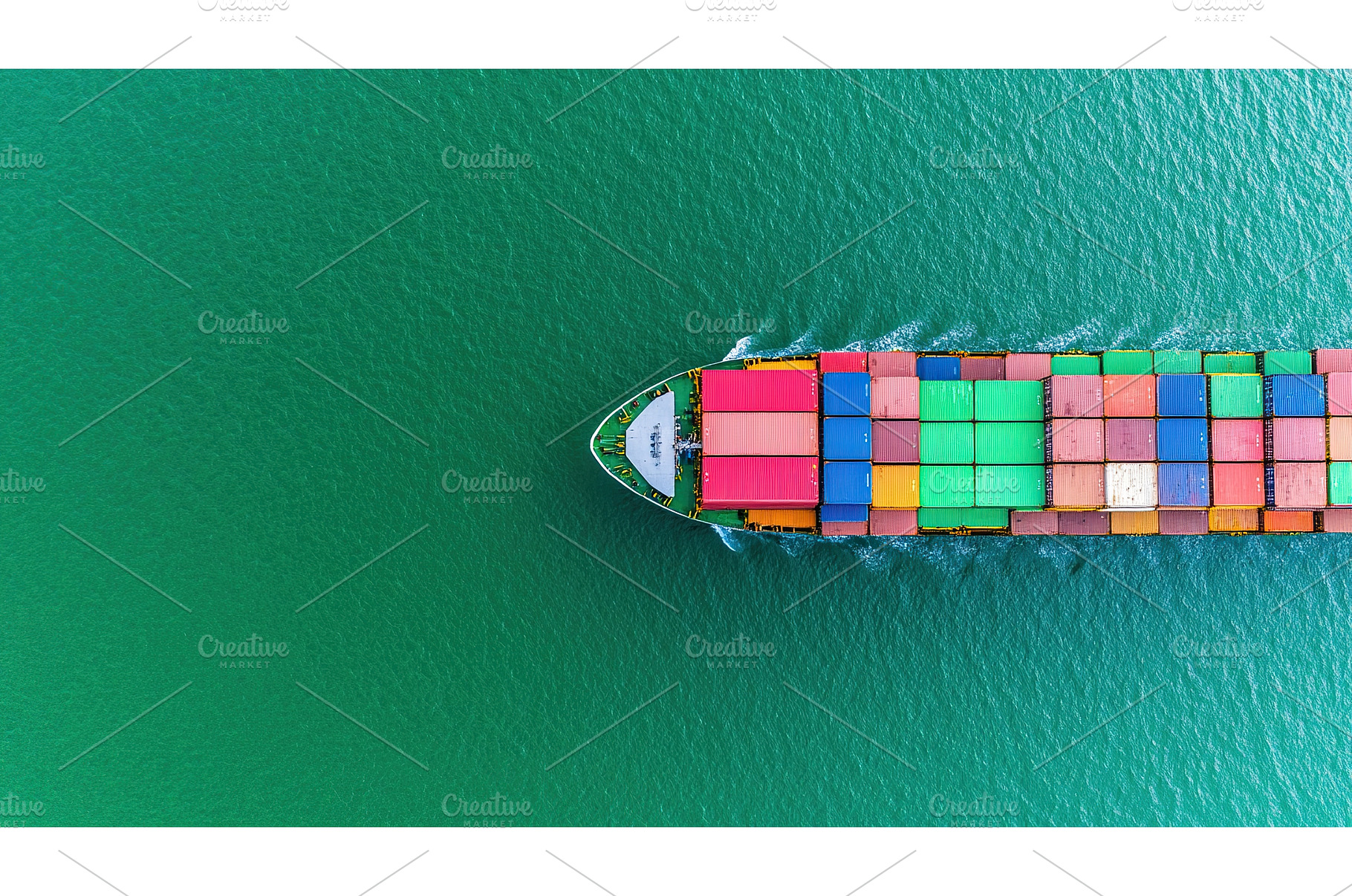 Aerial view of cargo ship navigating, a Transportation Photo by Lermont51