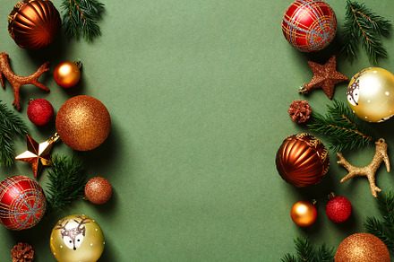 Green Christmas background with balls, decorations, fir branches. Christmas hol, a Holiday Photo by photoguns