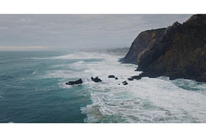 Praia da Adraga beach with ocean, a Nature Photo by Goinyk