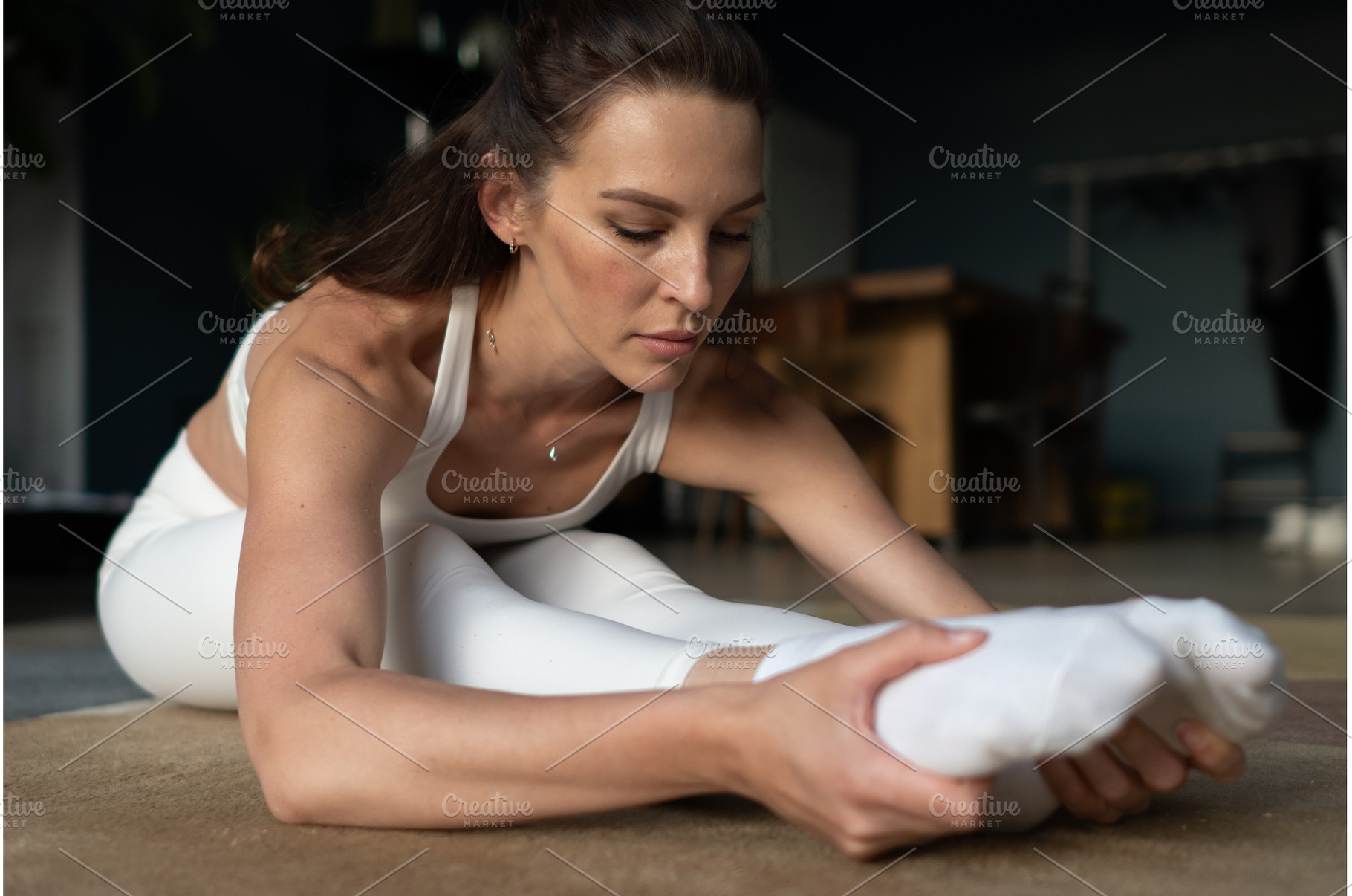 Fit woman doing yoga stretching in, a Sports & Recreation Photo by undrey