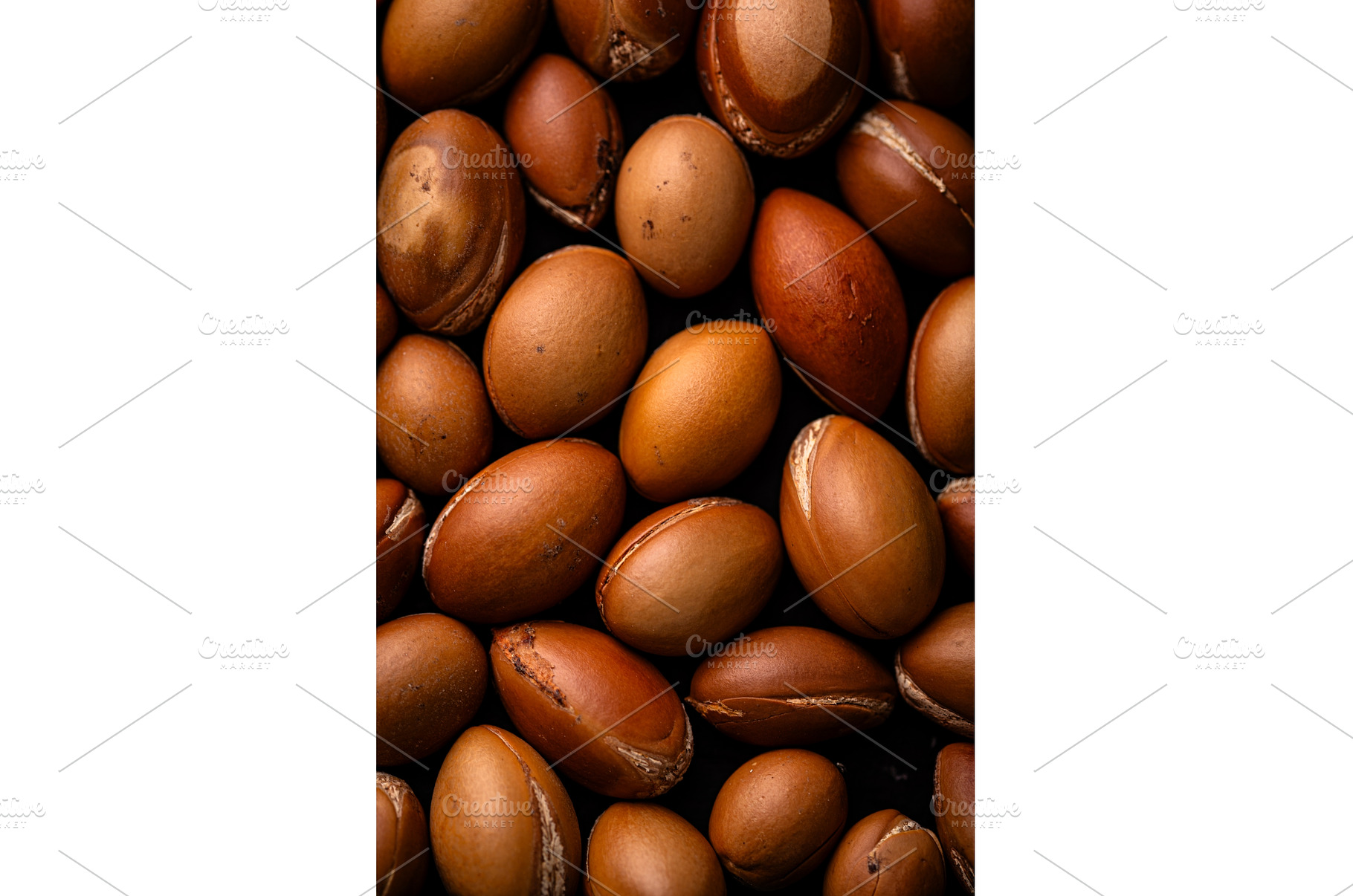 Close-up of brown macadamia nuts, a Food & Drink Photo by Yulia Furman