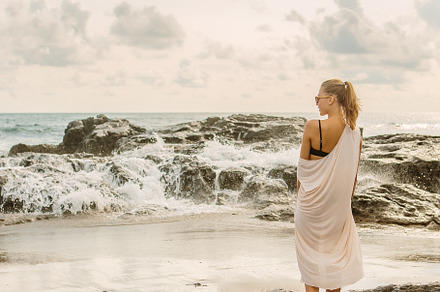 Pretty woman near danger rocks on oc containing woman, sea, and girl