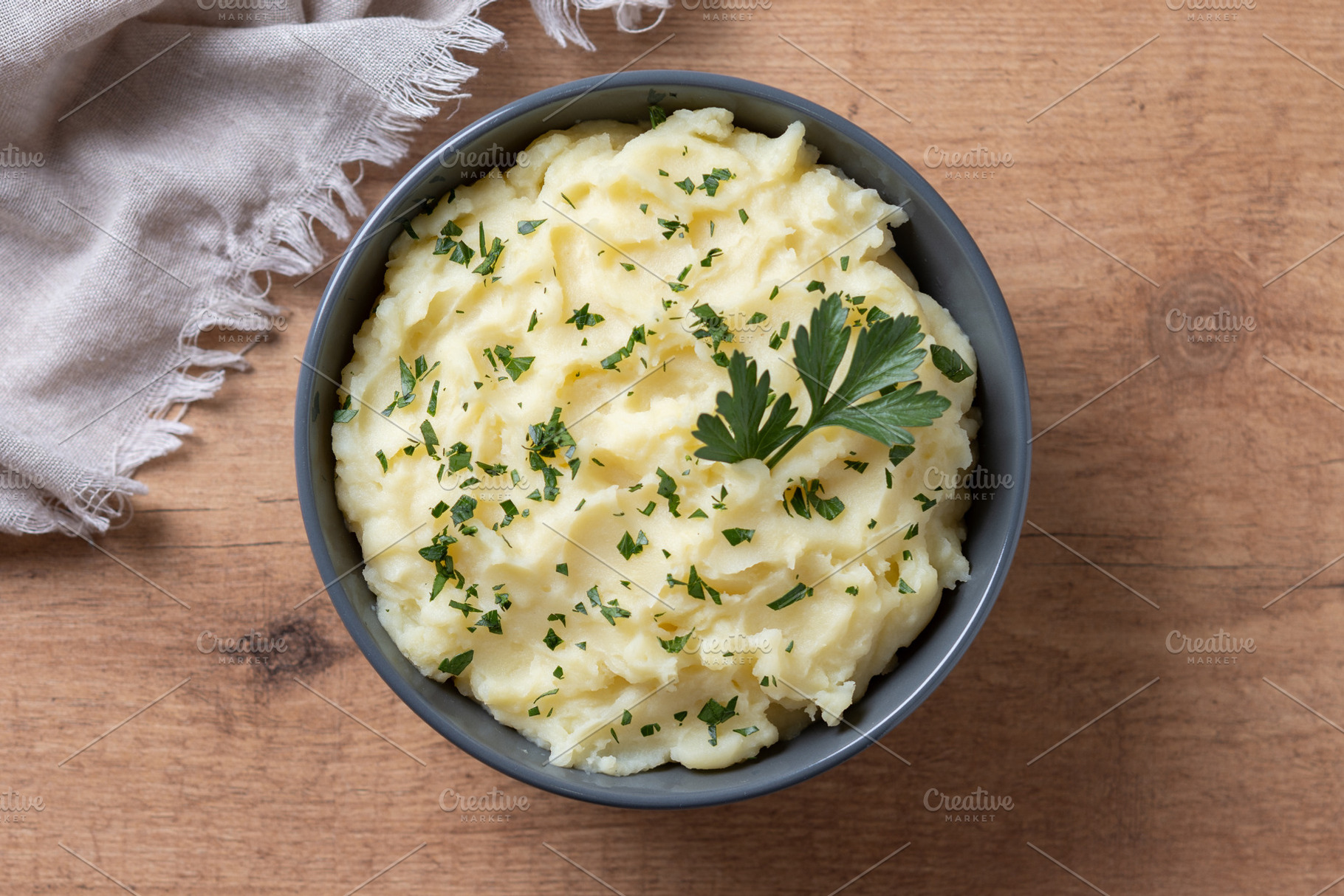 Creamy mashed potatoes in black bowl, a Food & Drink Photo by etorres69
