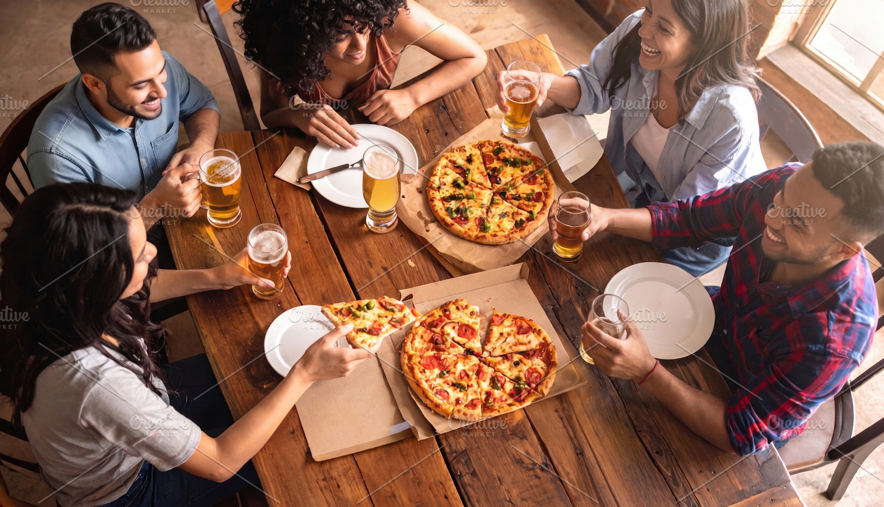 Friends Enjoying Pizza and Beer Together, a Photo by Davizro's Market