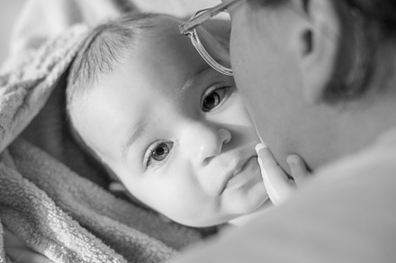 Portrait of a nine month old baby after bath time