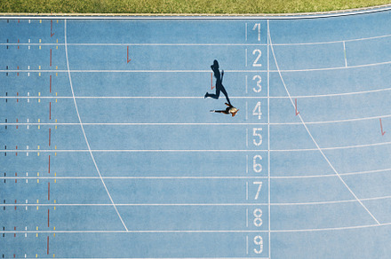 Track and field track with sprinter, a Sports & Recreation Photo by Jacob Lund